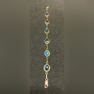 J J, Turquoise and Blue Tone Colored Glass Stones and Sterling Silver Bracelet.